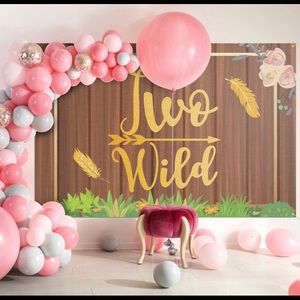 Two wild back drop and cake topper.